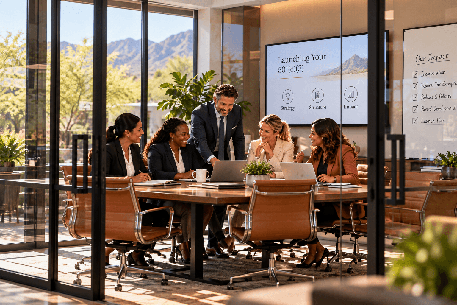 Diverse team collaborating on a nonprofit launch in a modern office with mountain views.